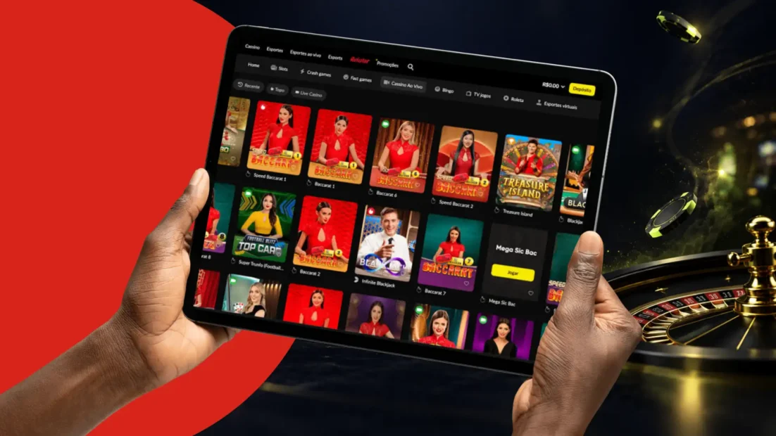 Tablet com a lobby do cassino ao vivo da BetBoom, com mesas de bacará, blackjack e game shows.